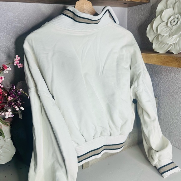 lululemon athletica Cropped Cream Varsity Jacket with Striped Trim - Picture 5 of 5